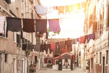 Laundry hanging from apartment buildings in Venice
