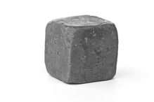This is a cube of the element lead. Lead is a dull-looking soft, malleable, heavy metal.