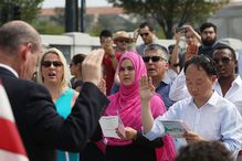 New US citizens being sworn in at the WWII Memorial in Washington DC