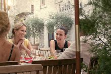 people having meal at French cafe