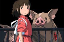 Shen stands near her parents, who have been turned into pigs