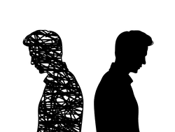 Young man faced away from an identical silhouette.