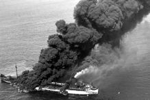 The convoy ship SS Pennsylvania Sun burns after being struck by a torpedo in the North Atlantic, July 15, 1942