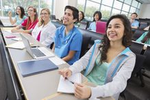 Nursing or medical students in college lecture hall classroom