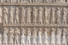 Stone relief depicting Syrians bearing tribute to Darius the Great of Persia