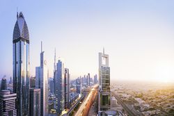 High angle cityscape of Dubai skyline - digital composite