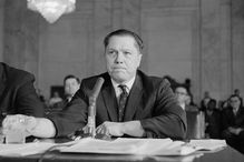 Black and white photograph of Jimmy Hoffa testifying before a Senate committee.