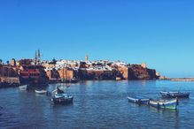 Boats Moored In Sea Against Clear Sky