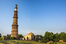 Qutub Minar against blue sky in Delhi