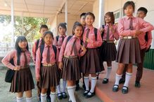 Group of school children in uniform.