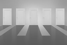 Five white doors in a row, representing five options in the decision-making process