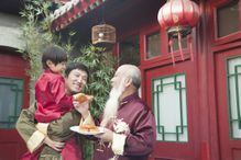 Chinese family sharing moon cake