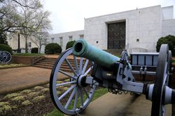 An antique cannon outside the United Daughters of the Confederacy Building