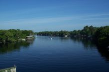 Saint Johns River in Florida stretching into a blue sky.