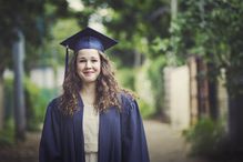 Graduate in their gown