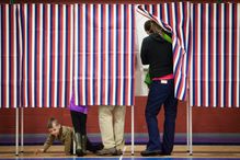 Voter entering U.S. voting booth