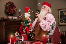 Santa Claus Painting Nutcracker in Toy Shop