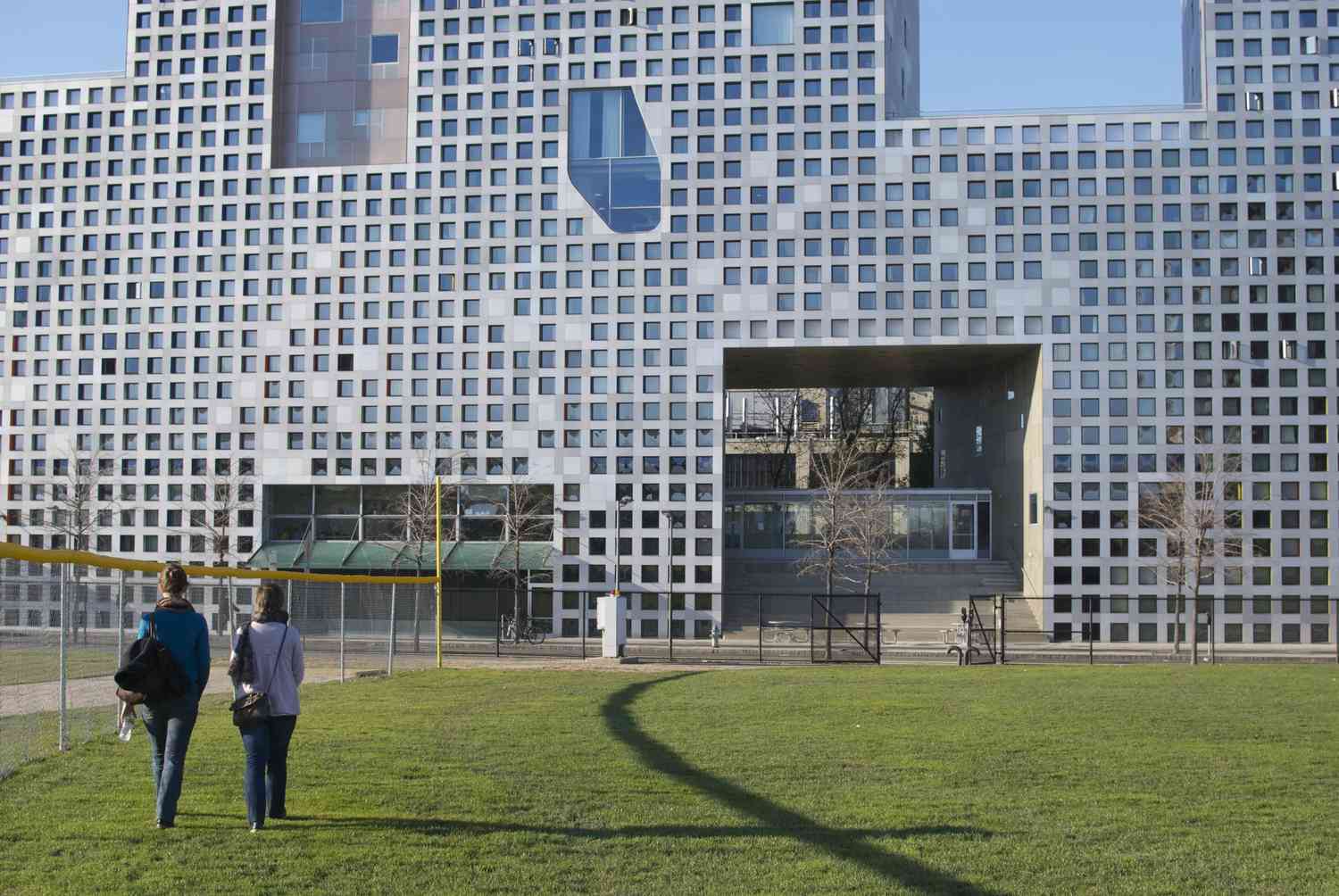 Two students approaching Simmons Hall dorm, MIT