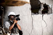 SIRTE, LIBYA - Journalist Jim Foley films Libyan NTC fighters attacking Colonel Gaddafi's home city of Sirte in October 2011.