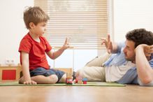 Father practicing counting with son