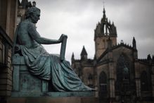 Statue of philosopher David Hume near St. Giles Cathedral on the Royal Mile in Edinburgh, Scotland.