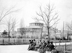 Immigrants sit on benches at the Castle Garden immigration station in New York City.