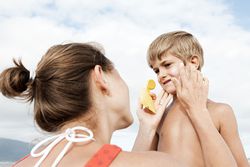 Mother and Son with Sunscreen