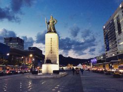 Low Angle View Of Admiral Yi Sun-Shin Statue In City Against Sky