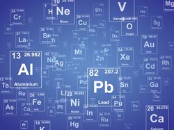 Graphic rendering of the periodic table of elements on a blue background.