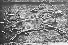 An Assyrian king, likely Ashurbanapal, hunting in Mesopotamia