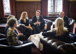 Small group of people holding an informal meeting