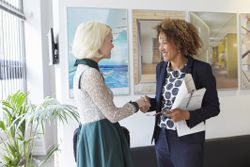 Two women introducing each other