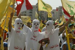 Hezbollah supporters wave flags during a ''Victory over Israel'' rally in Beirut's suburbs on September 22, 2006 in Beirut, Lebanon