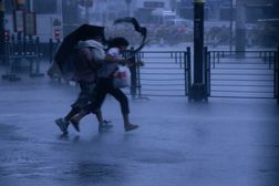 Typhoon force 8 hits pedestrians in the street