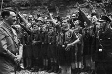 Adolf Hitler with uniformed Saxon youths in 1933