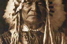 A portrait of an Arikara man published in Volume V of The North American Indian (1909) by Edward S. Curtis.