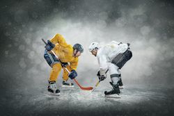 Ice hockey player on the ice, outdoors