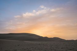 The Taklimakan Desert of Xinjiang at sunset.