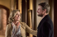 Arrow - Susanna Thompson as Moira Queen and Stephen Amell as Oliver Queen/Green Arrow - 'Starling City'