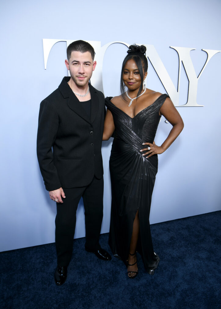 Nick Jonas and Adrienne Warren attend The 77th Annual Tony Awards at David H. Koch Theater at Lincoln Center on June 16, 2024 in New York City.