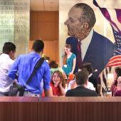 Students mingle inside the LBJ School of Public Affairs.