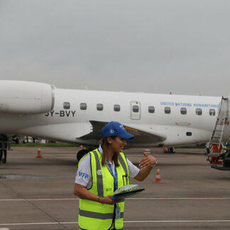 WFP staff coordinating transportation of humanitarian assistance to hard-to-reach affected areas in Cameroon via the UN Humanitarian Air Service