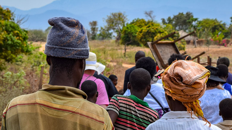 Family of villagers walking to church in Malawi